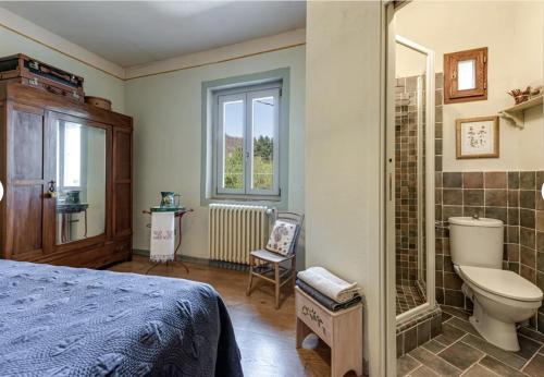 a bedroom with a bathroom with a toilet and a shower at Historic Villa In The Florence Hills in Borgo San Lorenzo