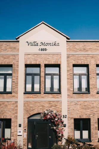 a building with a sign that reads ville maurice at Boutique Hotel Villa Monika in Westerland (Sylt)