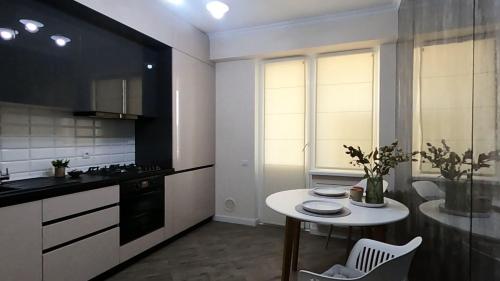 Virtuvė arba virtuvėlė apgyvendinimo įstaigoje ApartDirect Botanic Star