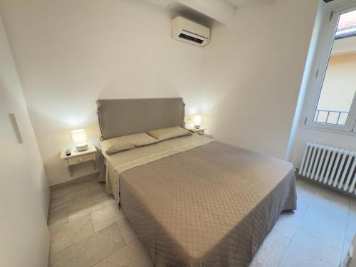 Ένα ή περισσότερα κρεβάτια σε δωμάτιο στο Centre of Alassio, 2 steps from the Sea