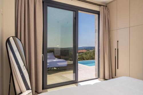 Πισίνα στο ή κοντά στο Aggelatos Stone Villas