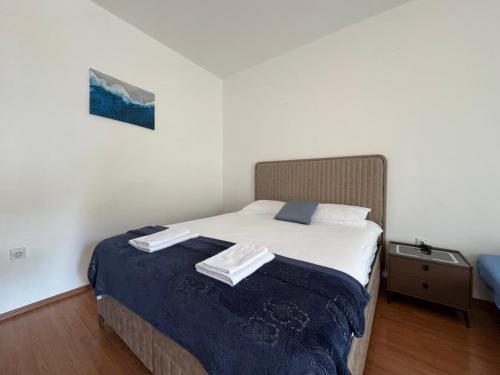 Cama o camas de una habitación en FOR-A Apartmani