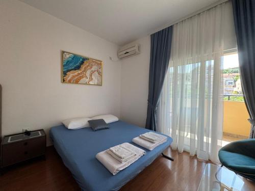 Cama o camas de una habitación en FOR-A Apartmani