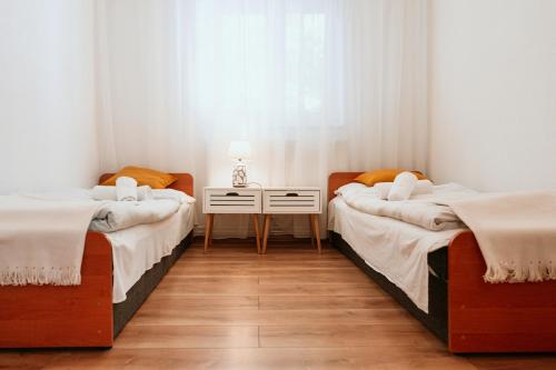 Giường trong phòng chung tại Rekreačné stredisko Bojnice - Nad Zámkom