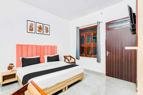 Ένα ή περισσότερα κρεβάτια σε δωμάτιο στο [Day Stay - 8 AM to 8 PM] Collection O Sector 12 Bhiwadi