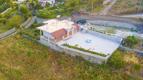 an overhead view of a pool with a water park at Vila Beleri 