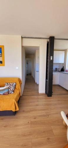 En eller flere senge i et værelse på Bambou Beach 2 à 50m de la Plage