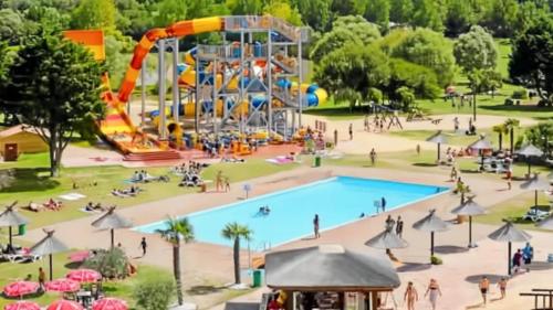 an artist rendering of a park with a roller coaster at Appartement moderne à Saint-Hilaire-de-Riez de 51 m² avec balcon in Saint-Hilaire-de-Riez