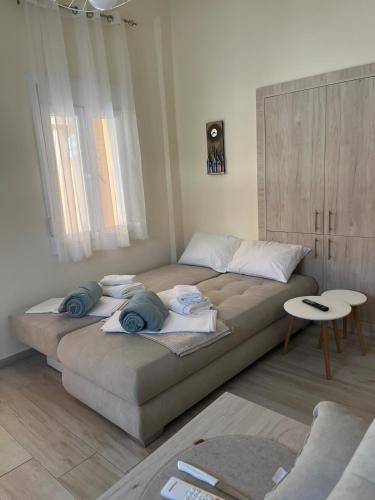 a bedroom with two beds in a room at Two little olives Studio apartment in Kissamos