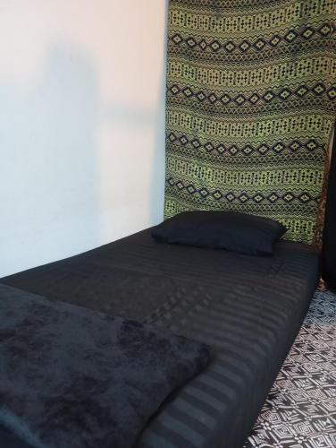 Letto o letti in una camera di Lita Guesthouse