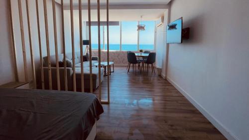 a living room with a view of the ocean at Sky&Beach Apartments in Aguadulce