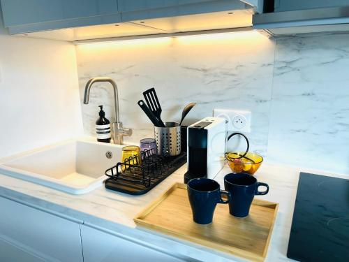 Una cocina o zona de cocina en Welcome to Montmartre