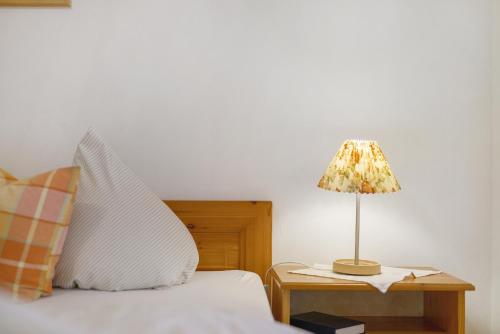 Postel nebo postele na pokoji v ubytování Hotel Eichberg by Ranæla