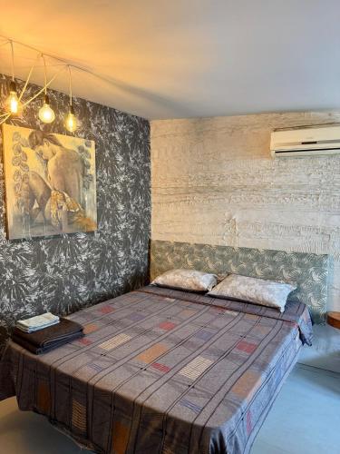 a bedroom with a large bed in a room at Art Lux Studio 1 in Burgas City