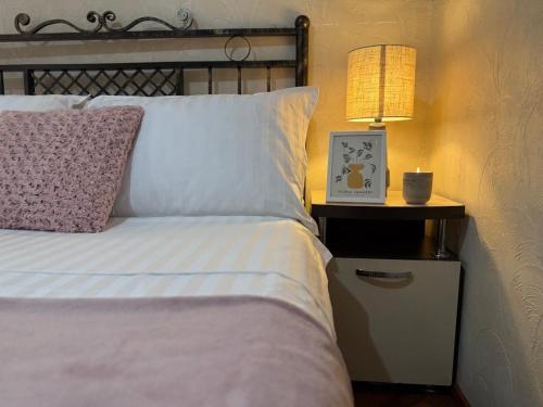 Home Boutique Hotelにあるベッド
