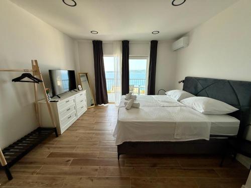 Posteľ alebo postele v izbe v ubytovaní Guest House Stipe