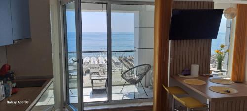Televisyen dan/atau pusat hiburan di Infinity by Seaside Holding