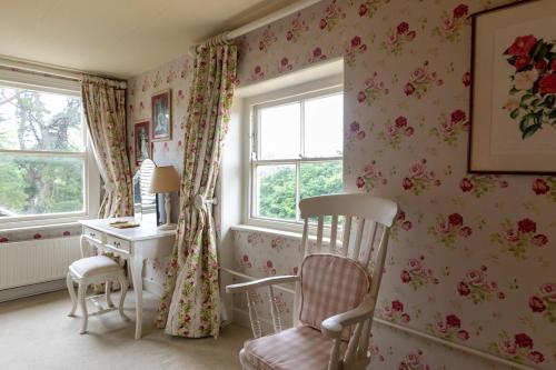 a room with a desk and a chair and a window at The Manners Sleeps 20 Private Bar Dining in Croxton Kerrial