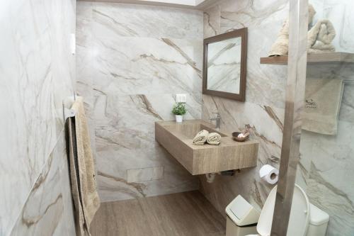 Koupelna v ubytování Hotel Curasi