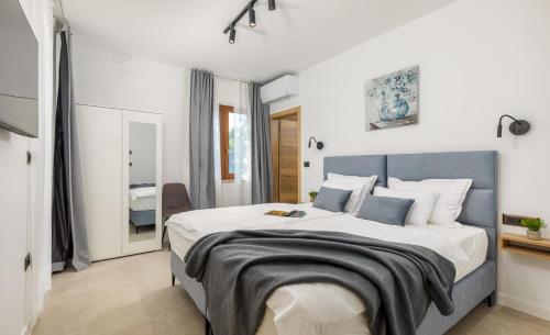 Giường trong phòng chung tại Villa Marija by Villsy