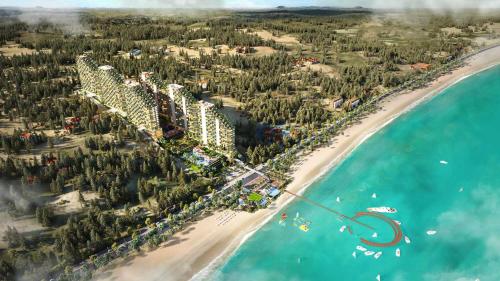 an aerial view of a resort on a beach at Golden Sands Bayfront Mũi Né in Mui Ne