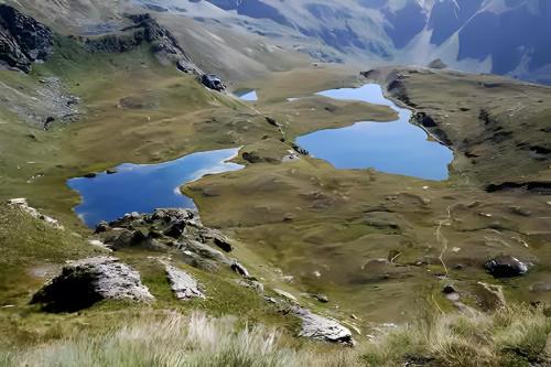 an aerial view of a mountain with two lakes at Maison du coeur - Bien-être in Challand Saint Anselme