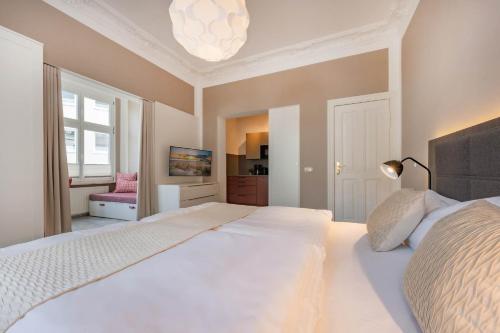 Postel nebo postele na pokoji v ubytování Villa Carmen Bernstein