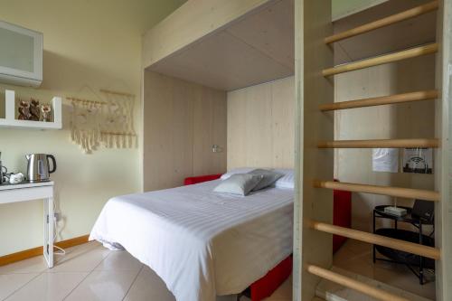 En eller flere senge i et værelse på Belvedere Guest House