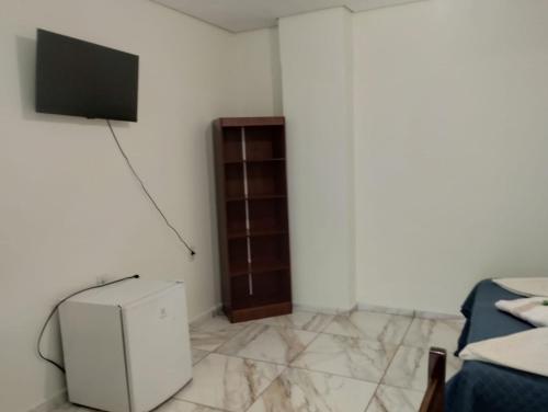 Et tv og/eller underholdning på Pousada São Benedito