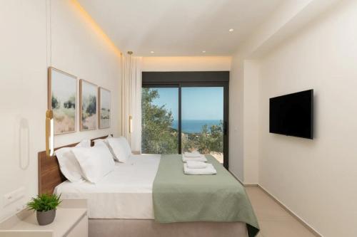 Ένα ή περισσότερα κρεβάτια σε δωμάτιο στο Luxury Villa Vie