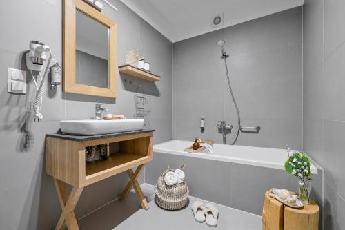 Un baño de Monte House Apartments Odkryj Zakopane