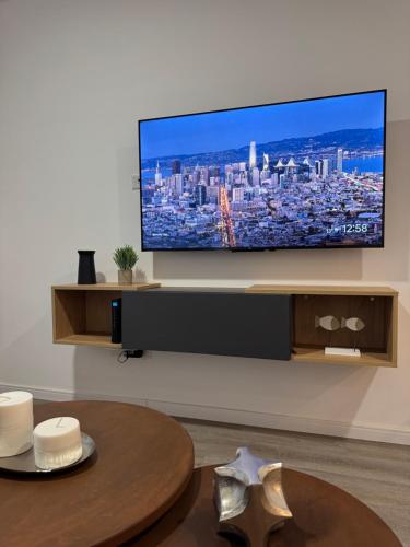 TV a/nebo společenská místnost v ubytování Campana Suites Castelli