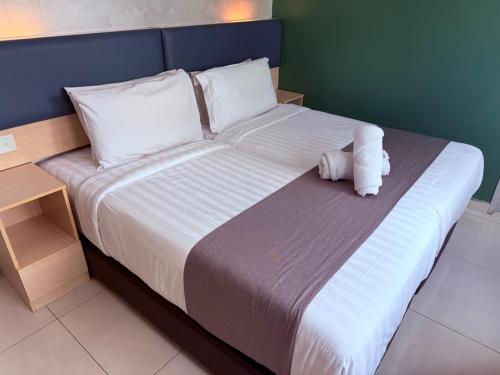 Postel nebo postele na pokoji v ubytování Eco Roomy Hotel