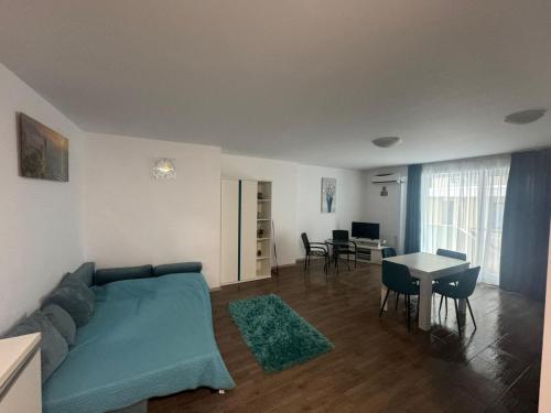 Posezení v ubytování Papaya Turquoise Apartament