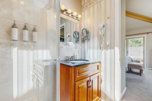 a bathroom with a sink and a shower at 8 Dixie Mountain Lane in Sunriver