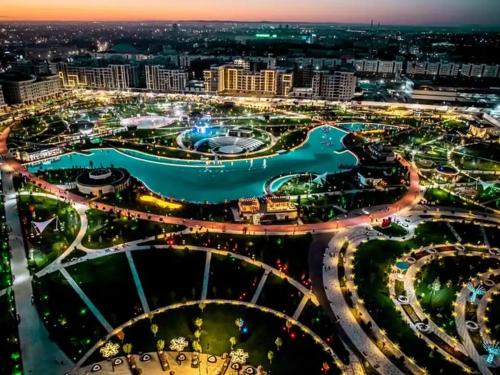 an aerial view of a city at night at Darhan in Tashkent