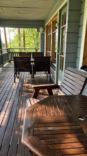 Balkoni atau teres di TAHKOn Riihiranta - 4 bedroom villa with lake view - Tilava mökki rantanäkymin