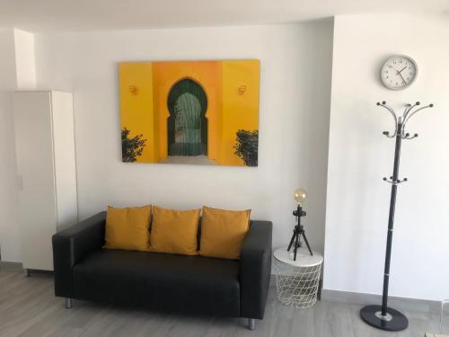 A seating area at Edificio Resort Gran8Nerja