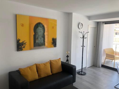 A seating area at Edificio Resort Gran8Nerja