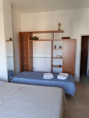 Postel nebo postele na pokoji v ubytování Manzoni