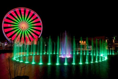 a ferris wheel and a large ferris wheel at Bear Tracks Lodge By Avada Properties in Sevierville