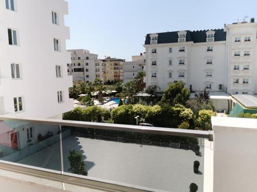 a view from the roof of a building with a swimming pool at SeaBreeze Apartments in Golem