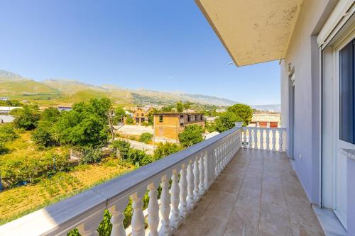a balcony with a view of a city at Hometown Apartment 2 in Gjirokastër