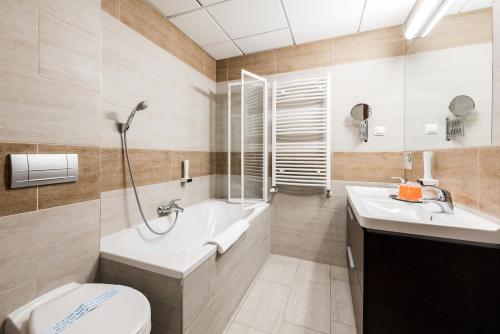 Koupelna v ubytování Hotel Garzon Plaza