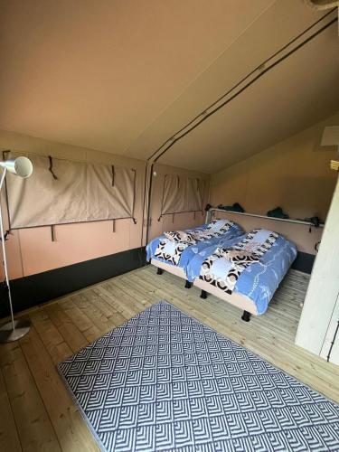 Ένα ή περισσότερα κρεβάτια σε δωμάτιο στο Romala's Glamping Hideaway