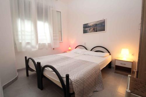 Posteľ alebo postele v izbe v ubytovaní Apartment in Rosolina Mare 25073
