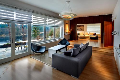 Posedenie v ubytovaní Vilas & Wellness Resort Orlík
