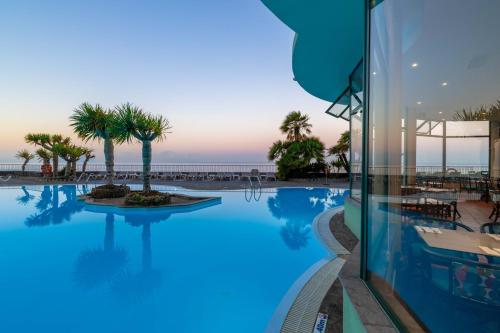 a view of a swimming pool at a resort at Pestana Ocean Bay Resort in Funchal