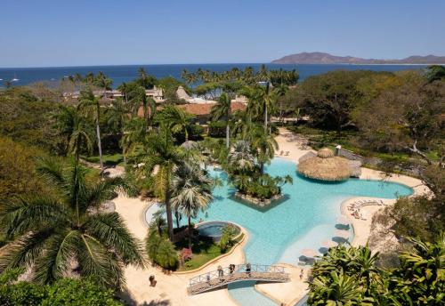 an aerial view of the pool at the resort at Matapalo Diria #504 Amazing Condo-Ocean View in Tamarindo