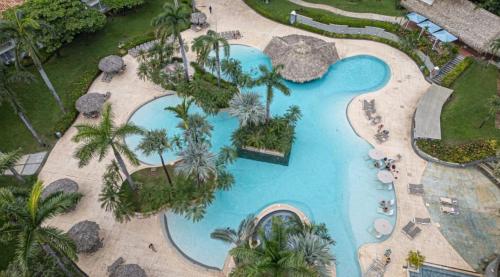 an overhead view of a swimming pool at a resort at Matapalo Diria #504 Amazing Condo-Ocean View in Tamarindo